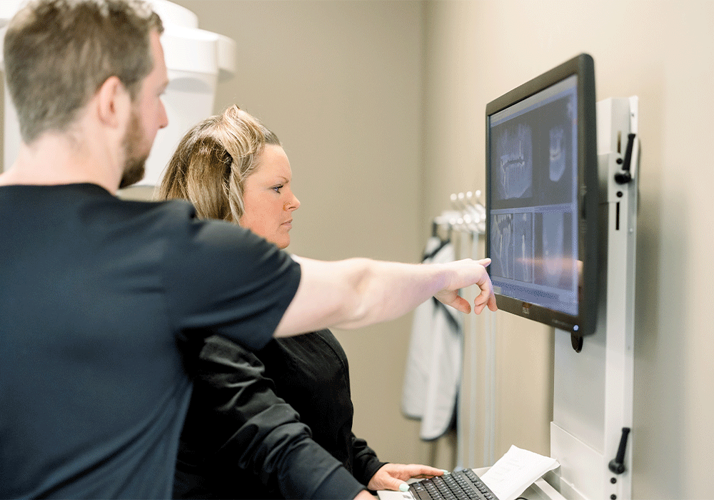 Dr. Meyer and Tracy looking at X-rays